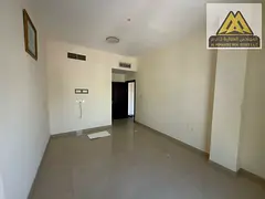 For annual rent: 1-bedroom apartment on Ajman Corniche with 2 bathrooms, balcony, sea view, free par