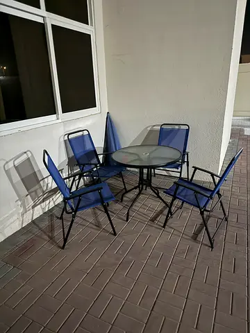 Outdoor 4-Piece Blue Patio Table and Chairs Set - with umbrella, Good Condition