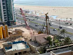 Two-bedroom apartment with an open sea view, inside a brand new building, featuring a modern design