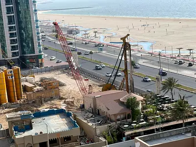 Two-bedroom apartment with an open sea view, inside a brand new building, featuring a modern design and spacious areas, in an exceptional location on