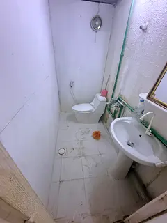 Room with bathroom attached near metro