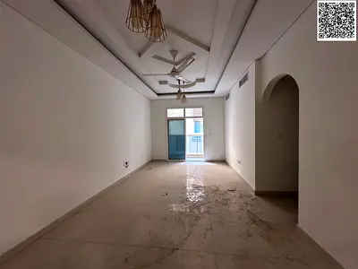 Free month! Elegant 2BR apartment, Al Mowaihat 3 on Sheikh Mohammed Bin Zayed Rd, near schools. Wardrobes, balcony, central AC