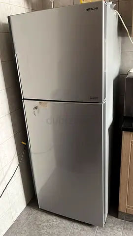 Silver Hitachi Double-Door Refrigerator - Good Working Condition