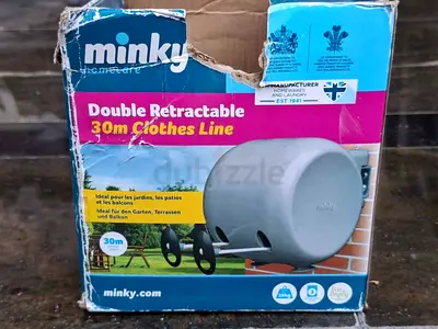 Double retractable clothes line
