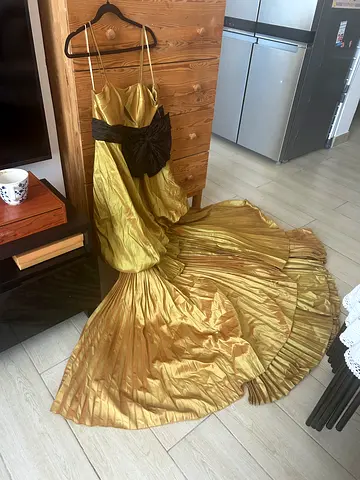 Gold evening/ball gown with black waist detail can easily customized to fit smaller sizes paid 2300