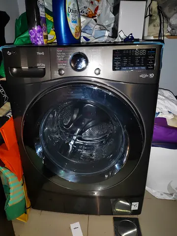 LG Front Load Washing Machine 12kg - Black Steel, Good Working Condition..price is negotiable.