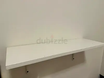 IKEA white wall-mounted floating shelf