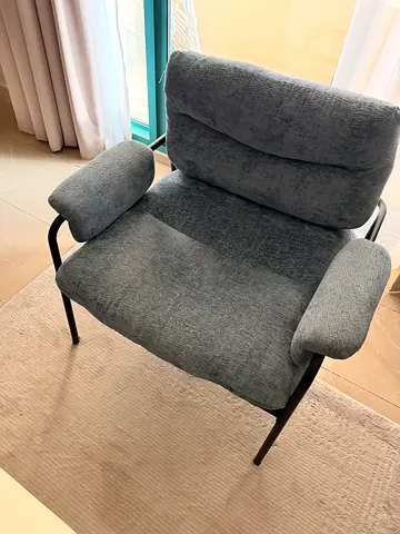 Grey Upholstered Lounge Chair with Armrests — Good Condition