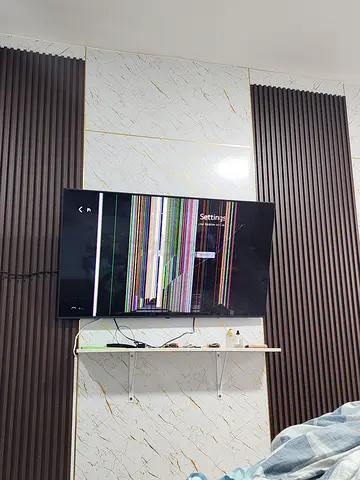 65-inch LED TV with damahed screen