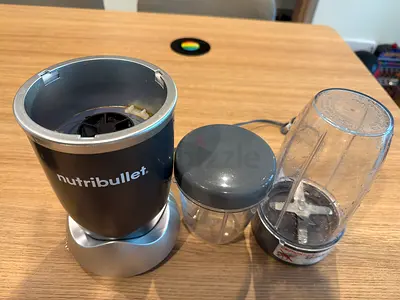 NutriBullet personal blender with jars and blade - used