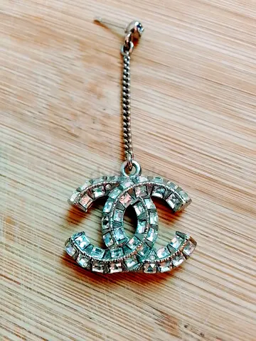 Authentic CHANEL earrings with original pouch