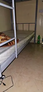 Room for bachelors, Dh. 1,500/= with Water  Electricity.