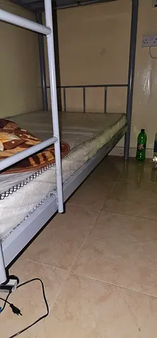 Room for bachelors, Dh. 1,500/= with Water  Electricity.