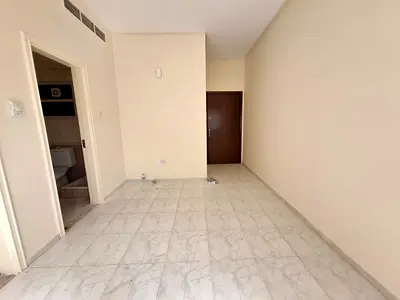 Family building !! Good Location !! Studio Apartment just 18k in Al Qasmia