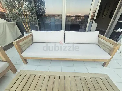 Outdoor wooden dining table (6 chairs)  sofa set with coffee table - great condition.