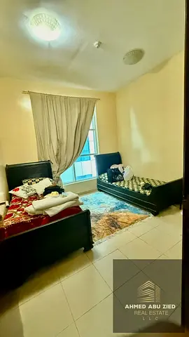 Two bedrooms and a living room for annual rent, furnished, in Ajman, City Towers, Al Nuaimiya 3, Kh