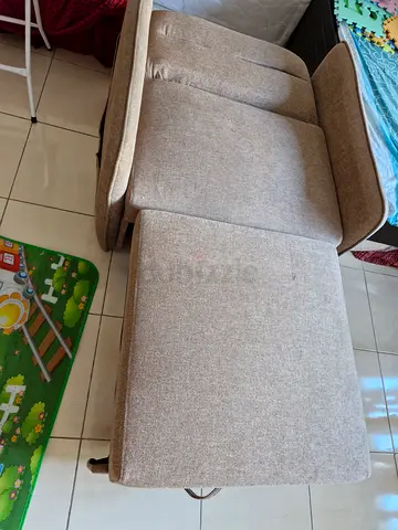 Beige Fabric Recliner/Armchair with Ottoman - Good Condition