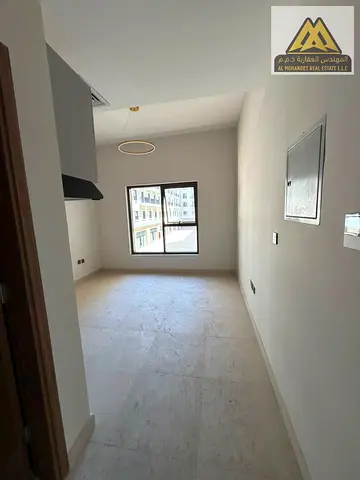Annual studio for rent in Al Zahia, Ajman, at Kenytia Residence. First tenant, central AC, free par