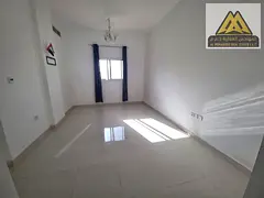 The apartment is located in Al Rashidiya 3 and includes a bedroom and a living room with a practical