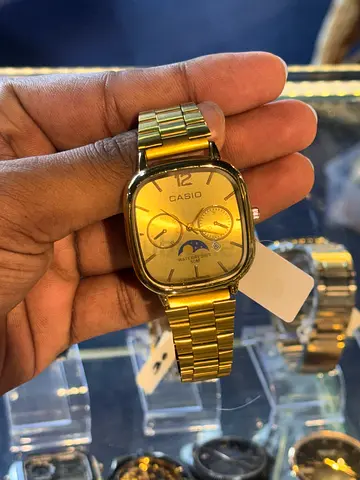 Gold-tone Casio mens wristwatch with moonphase display