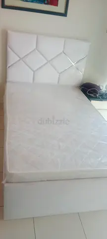 White color double bed with mattress - good condition