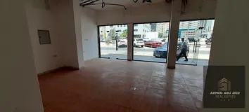 Shop for rent in Al Majaz 1 on a busy street with private bathroom, ideal for various businesses, fr