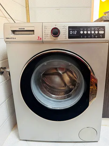 Title: Hoover Front Load Washing Machine – 7kg, 1200 RPM (Used, Needs Drum Replacement)