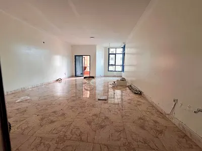 Al Nuaimiya Towers, Ajman: A spacious 3-bedroom apartment with a living room, high-end finishes, in