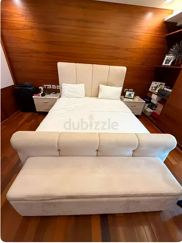 Beige Upholstered double bed with 2 side tables and Ottoman  all in excellent Condition