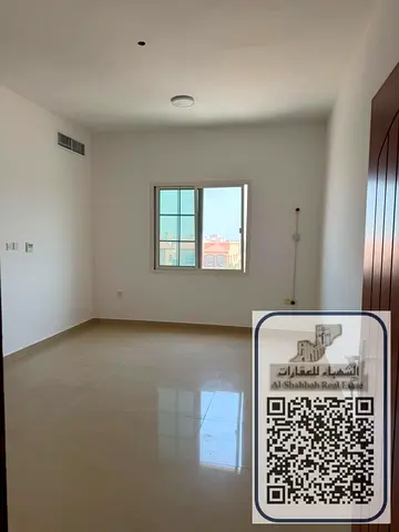 A separate kitchen studio apartment in Al Muwaihat, behind Nesto Al Tallah, with a large area and c