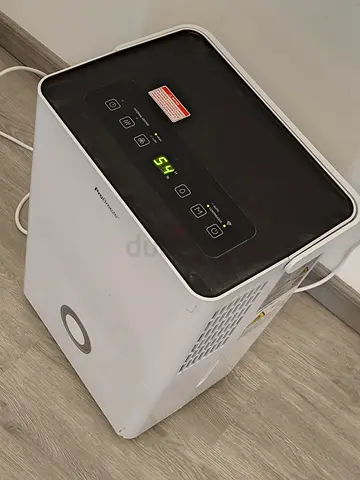 Portable dehumidifier - compact unit in good working condition
