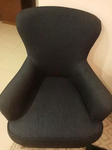 Comfortable dark blue pholstered lounge chair - good condition