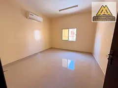 A spacious studio apartment with a semi-separate kitchen in the Al-Aliya area, close to all services