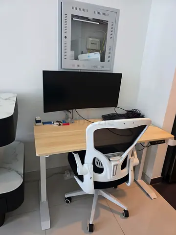 Height-adjustable standing desk with ergonomic chair