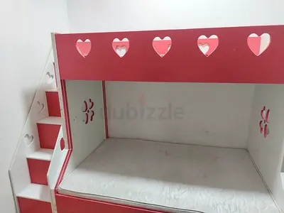 Pink and white kids bunk bed with stairs and heart cutouts - mattress included