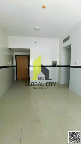 Live in Pearl Towers | Family-Friendly 1BHK with Separate Kitchen & Open Side View | Garden |Private Parking | Easy Access to Dubai | AED 31,000 Only