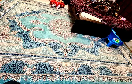 Light blue Persian-style area rug / carpet in good used condition (3.5 x 2.5 m)