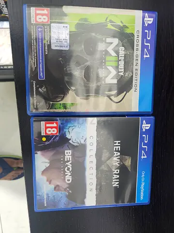 PS4 with 2 controllers Games: Call of Duty Modern Warfare II  Heavy Rain + Beyond Two Souls