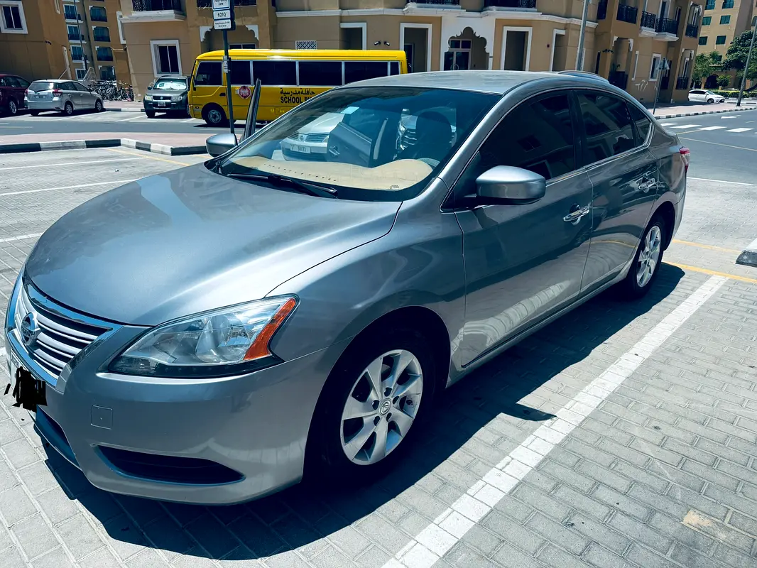 Nissan Sentra 2014 — photo 1 of 8