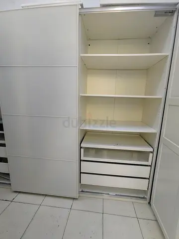 White Sliding Door Wardrobe with Shelves and Drawers - Good Condition