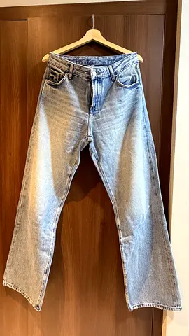 Light wash straight-leg mens jeans, size likely M/L, gently used