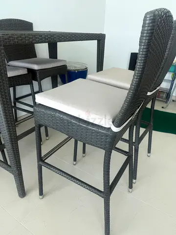 Outdoor rattan bar table with glass top and 4 high chairs set with cushions