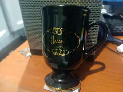 For sale: Authentic Herrods Black pedestal mug ...Like new and sticker still on it...Price 80AED
