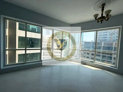 Apartment for annual rent - Al Majaz 3. Free air conditioning, one month free, free gym and pool, s