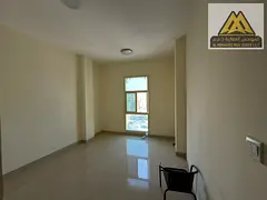 A spacious one-bedroom apartment is available for annual rent on Ajman Corniche, featuring a stunnin