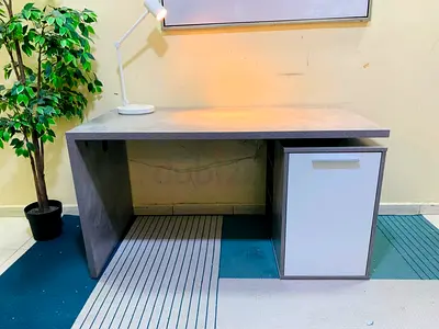Compact concrete-effect office desk with storage cabinet