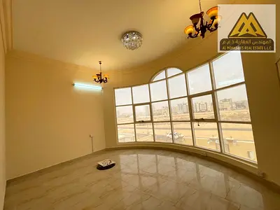 Annual villa for rent in Al Raqaib, Ajman. 6 bedrooms, majlis, living room, 7 bathrooms, maid’s roo