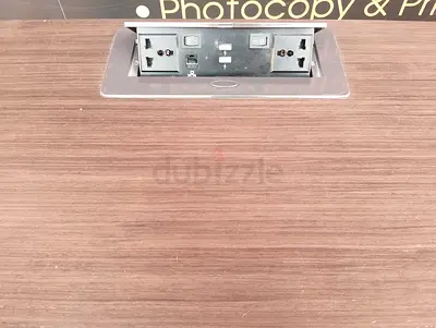 Office meeting table with built-in pop-up power module