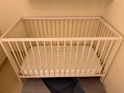 Ike gulliver crib + mattress and bedding