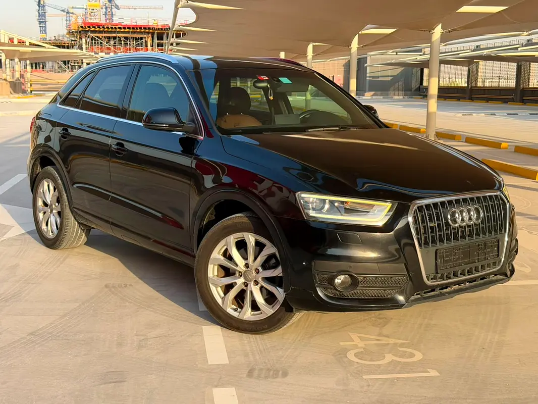 Audi Q3 2014 — photo 1 of 16